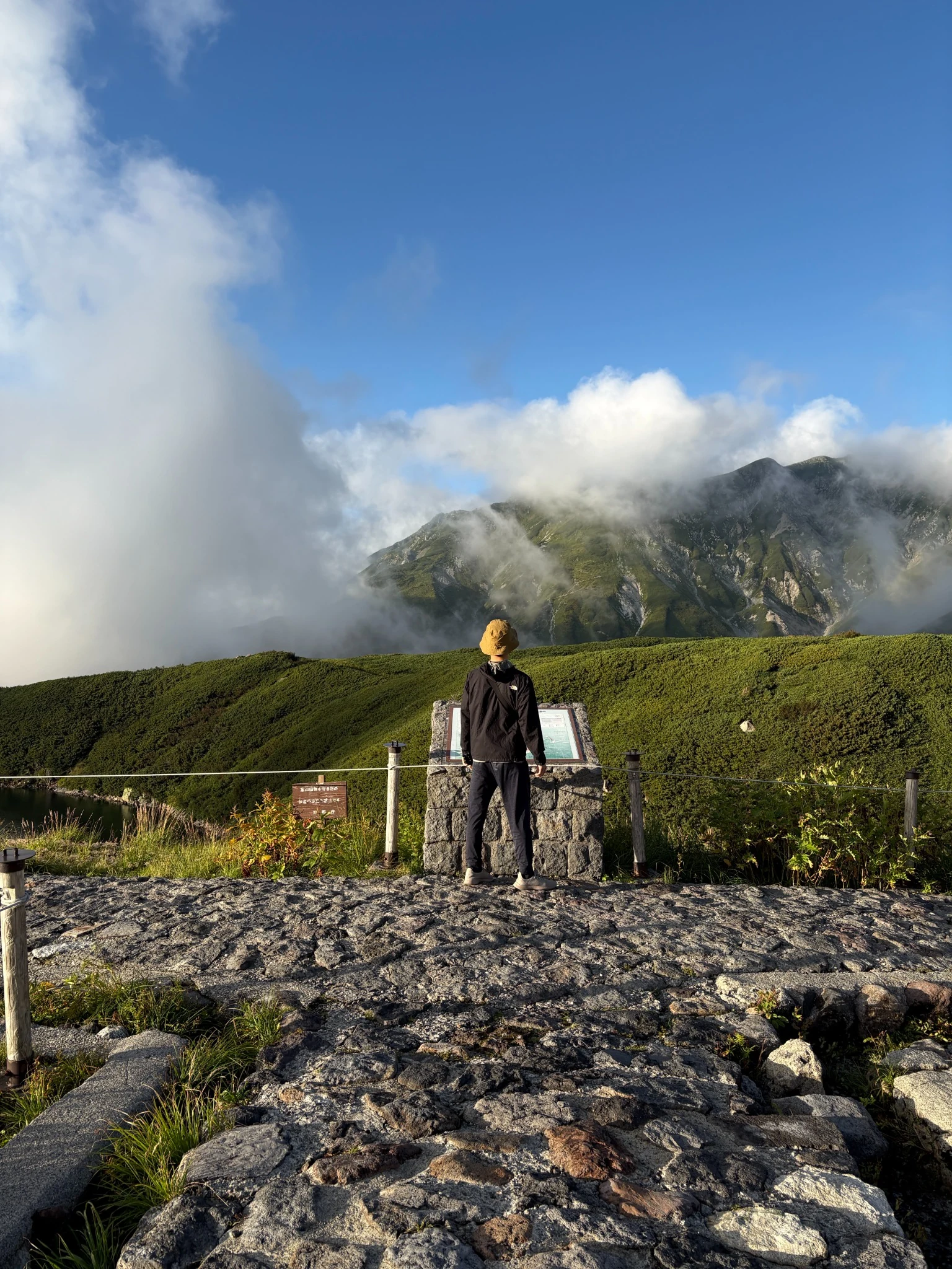 Haru looking toward the mountains near Mikurigaike in Tateyama