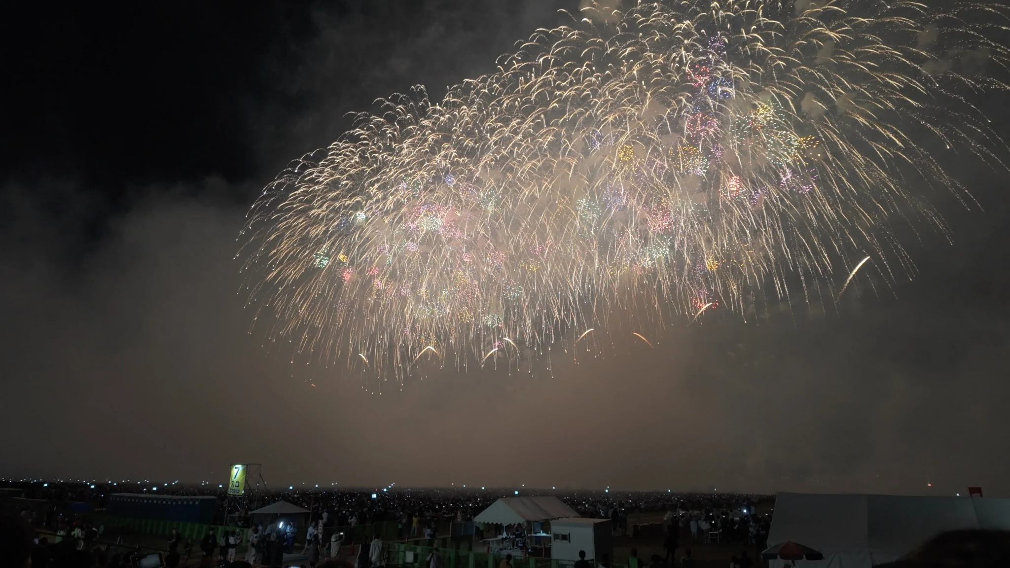 Golden fireworks over the Omagari festival grounds
